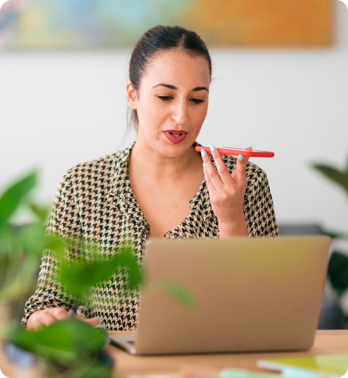 Woman providing status updates to suppliers and vendors. 