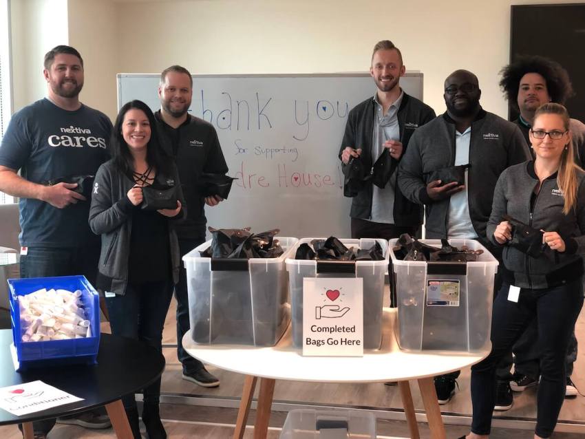 Team Nextiva Filling Bags for Andre House
